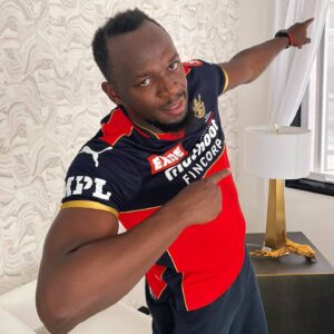 Usain Bolt wearing RCB Jersey