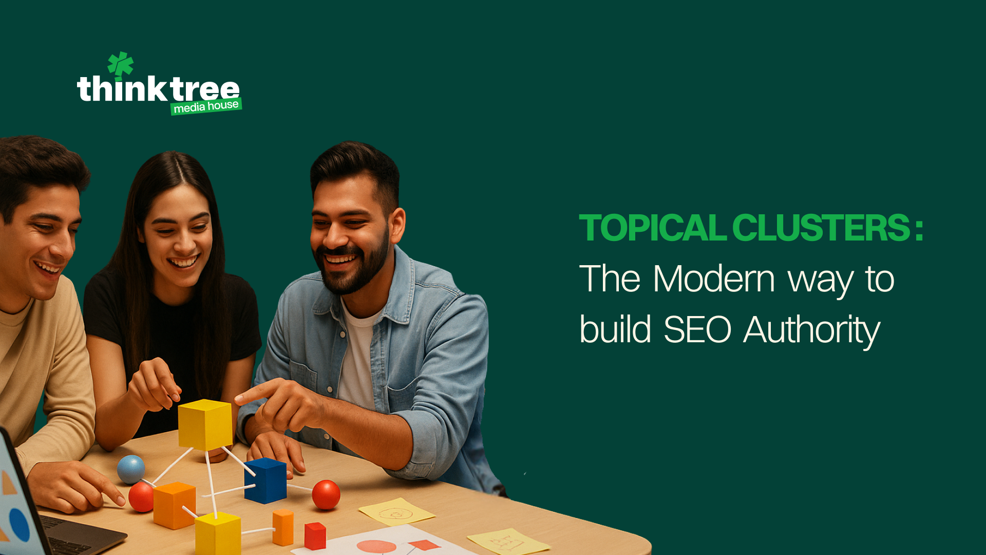 Team collaborating on SEO content strategy using a physical model of interconnected topic clusters and content pillars.
